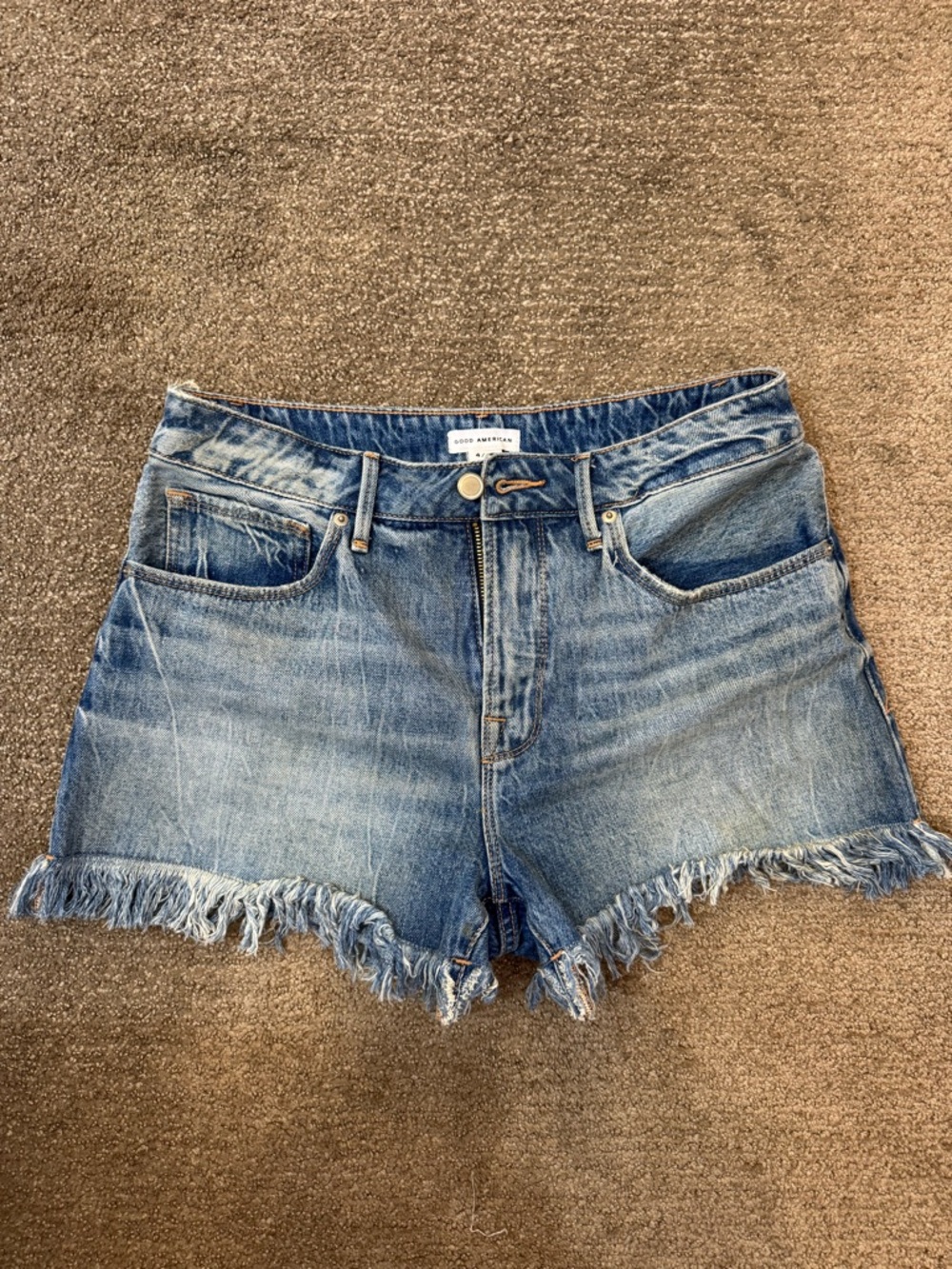 Good American Light Blue High-Rise Frayed Hem Jean Shorts